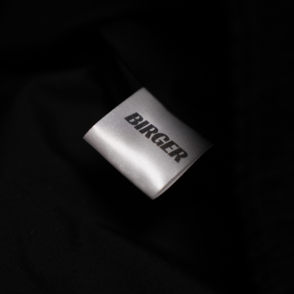 Close-up of the BIRGER brand label