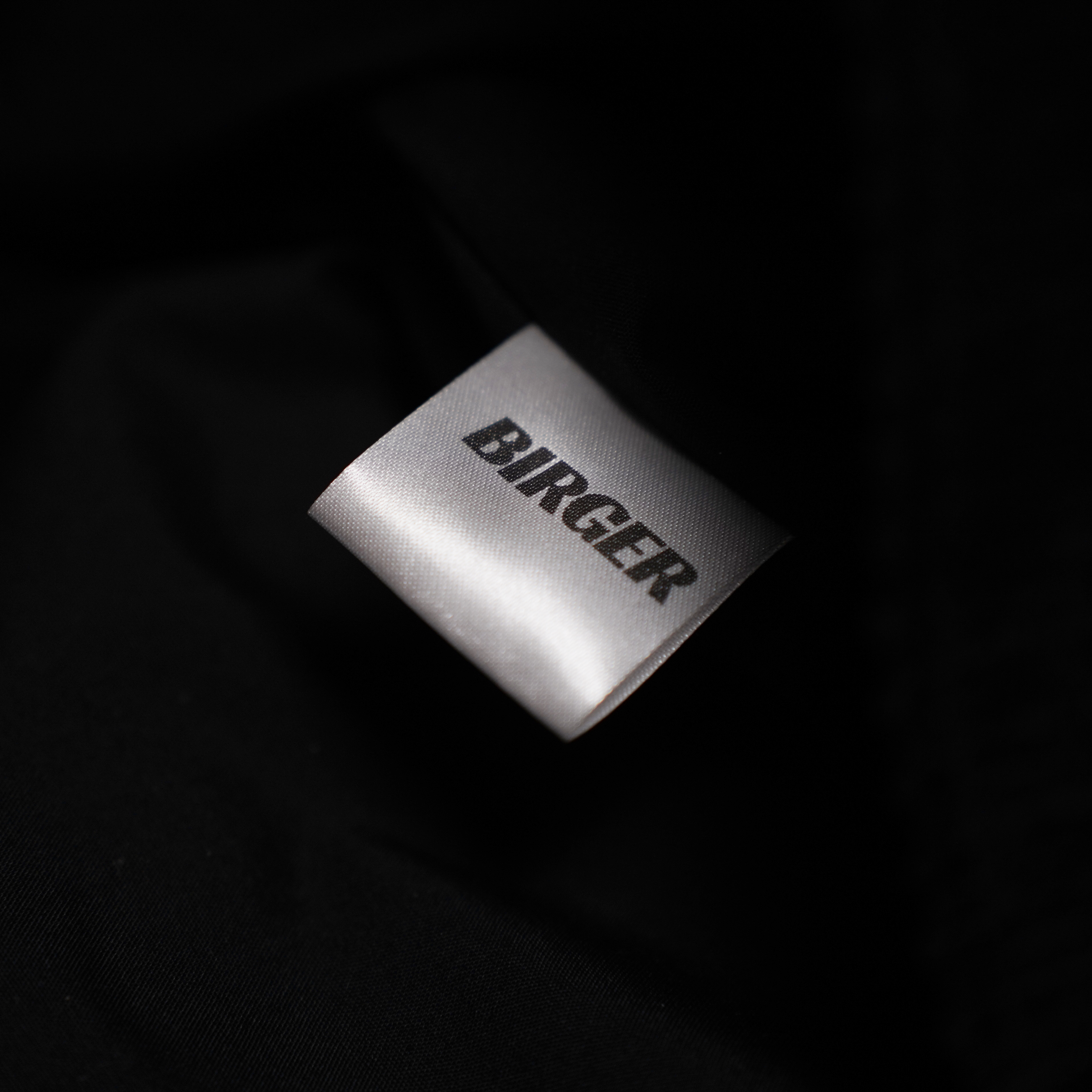 Close-up of the BIRGER brand label