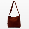 BIRGER rust brown corduroy sling bag, front view