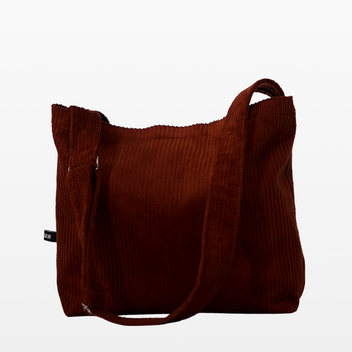 BIRGER rust brown corduroy sling bag, angled front view