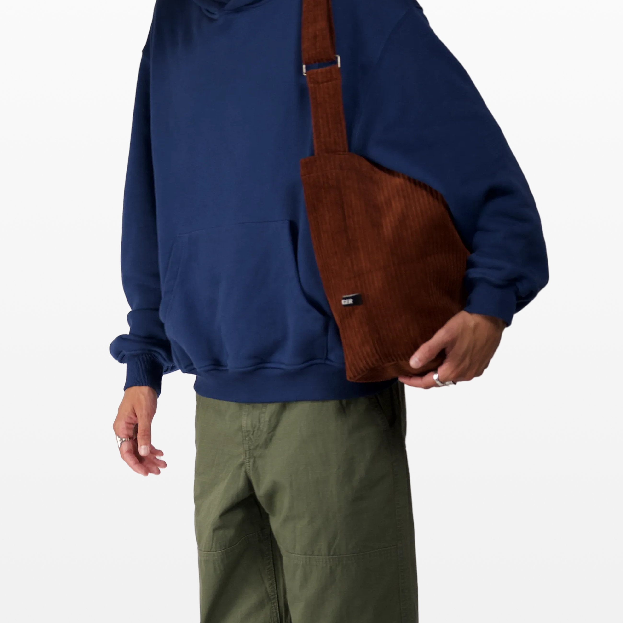 BIRGER rust brown sling bag worn over the shoulder angeled front view